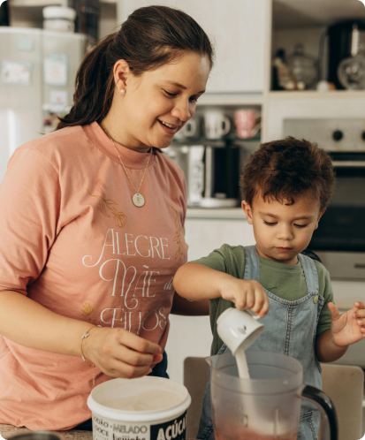 mom and son cooking enjoying their kitchen after an exterminator came by