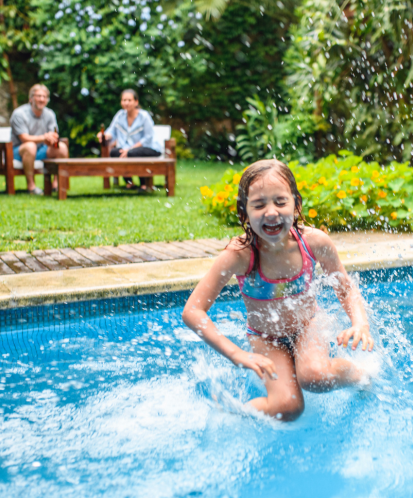 kid jumping in pool with no cockroaches